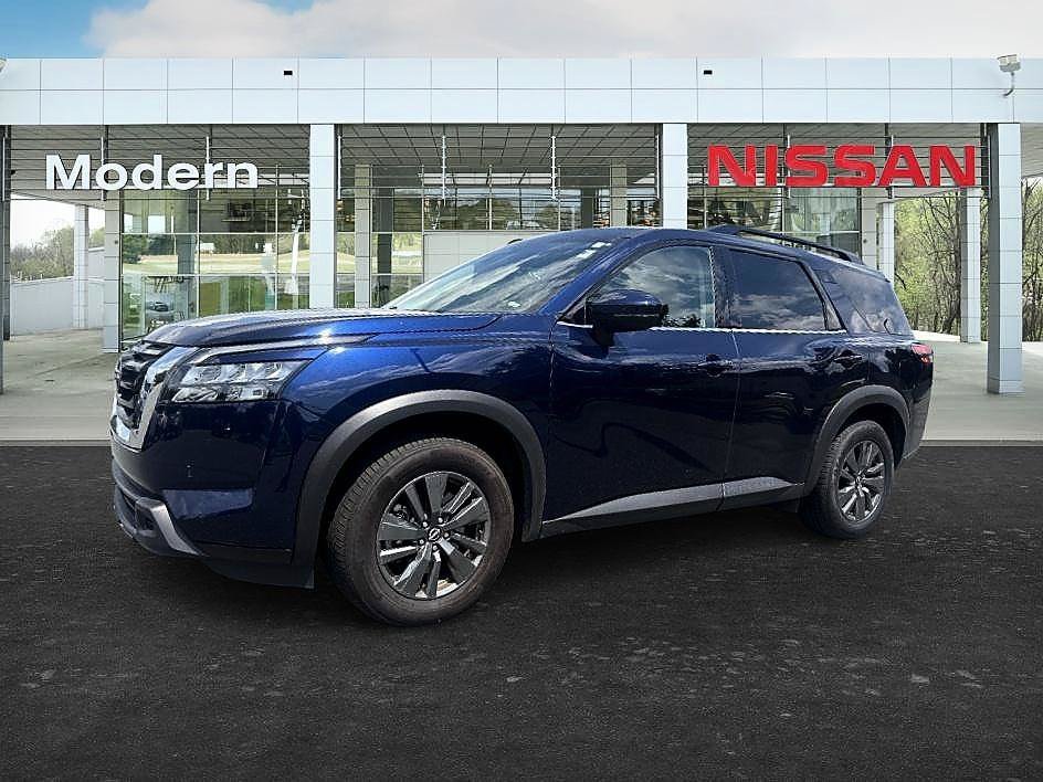 Used 2024 Deep Ocean Blue Pearl Nissan SV image 1