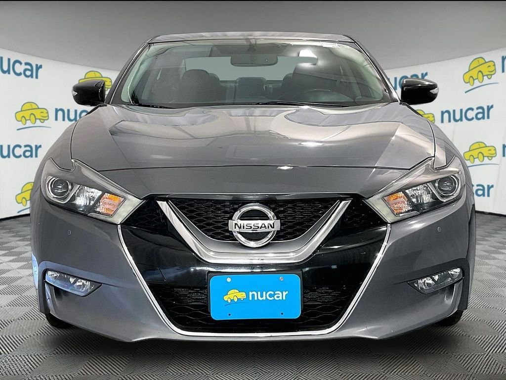 Used 2016 Gun Metallic Nissan SR image 2