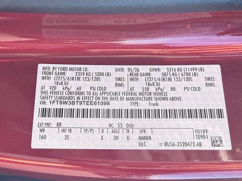 New 2026 Ruby Red Metallic Tinted Clearcoat Ford XLT 4WD Crew Cab 6.75