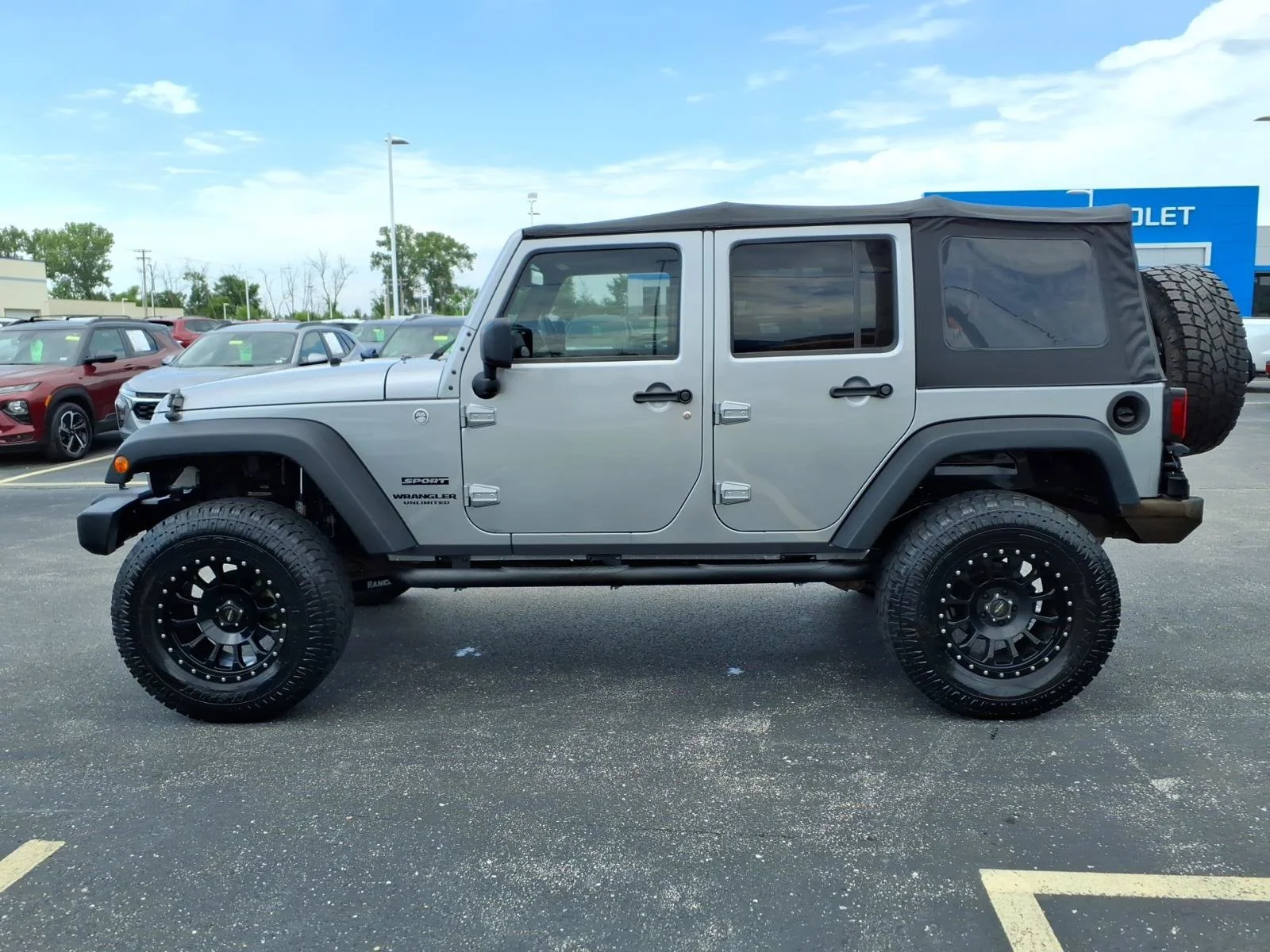 Used 2013 Billet Silver Metallic Jeep Sport image 4