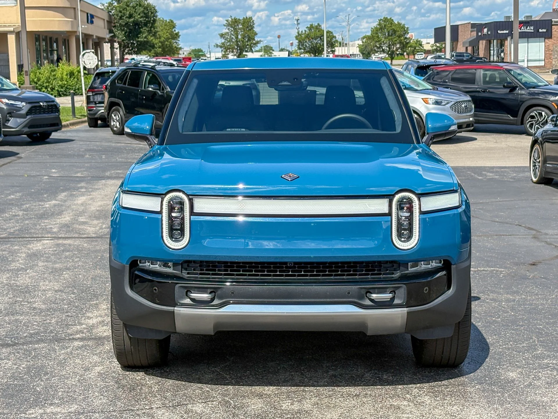 Used 2022 Blue Rivian Adventure image 3