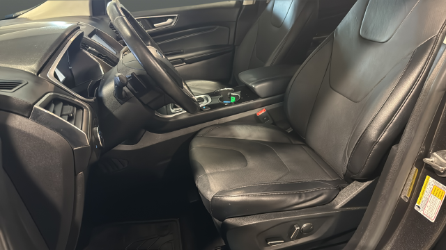 Used 2015 Magnetic Metallic Ford Titanium image 9