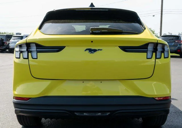 Used 2025 Yellow Ford Premium image 7