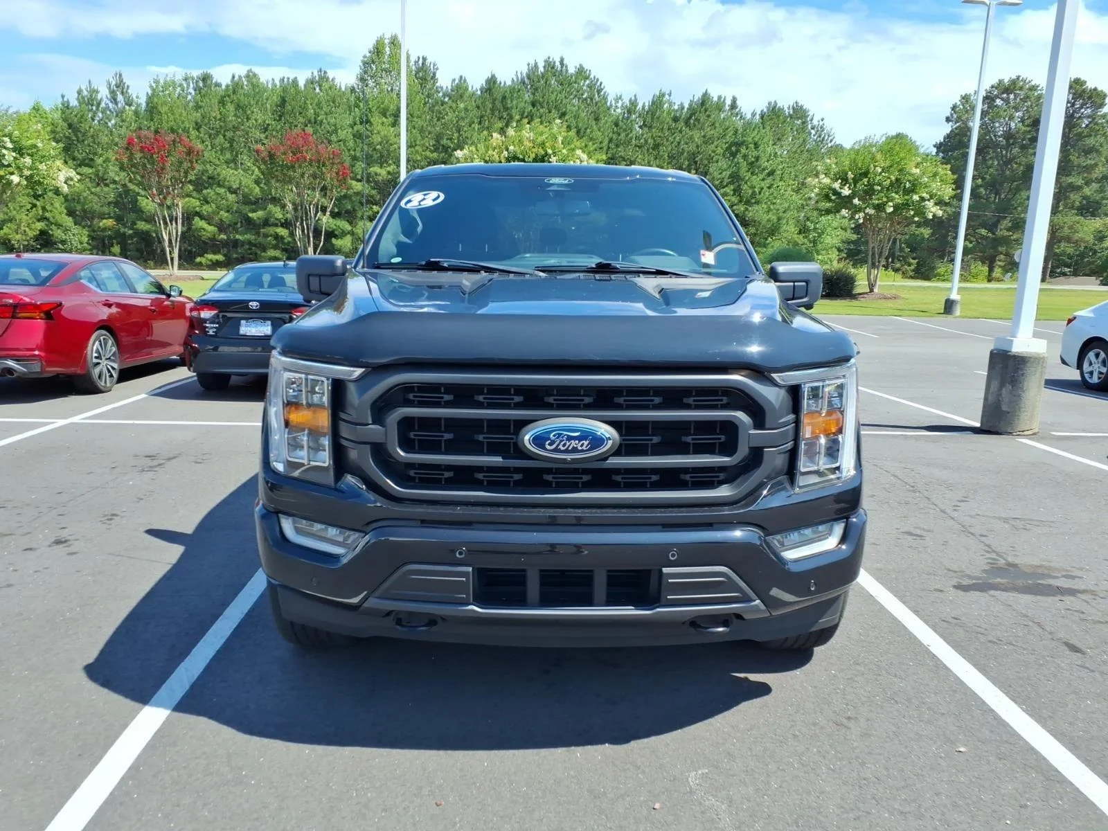 Used 2022 Agate Black Metallic Ford XLT image 2