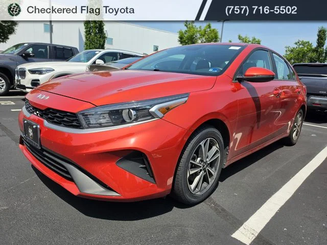 Used 2023 Fire Orange Kia LXS image 1