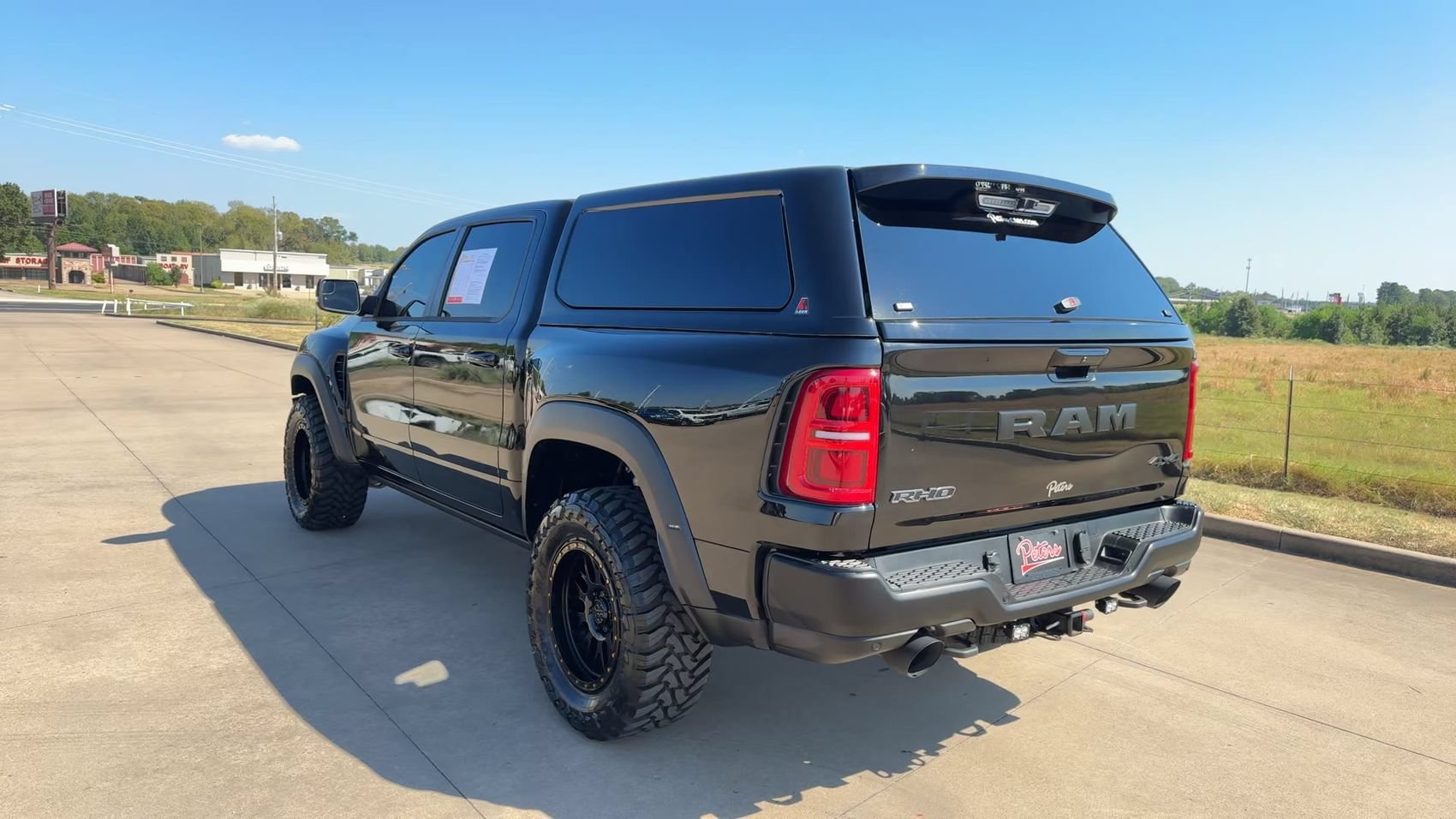 Used 2025 Diamond Black Crystal Pearlcoat Ram RHO image 7
