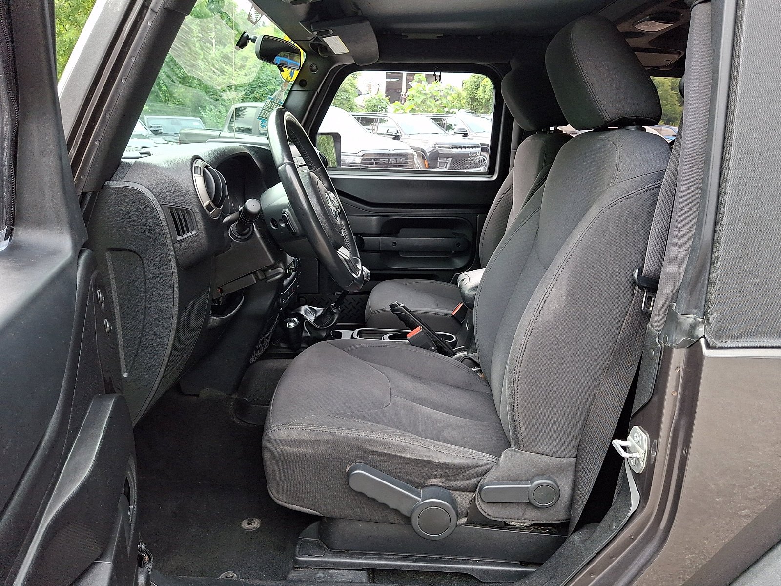 Used 2016 Granite Crystal Metallic Clearcoat Jeep Sport image 13