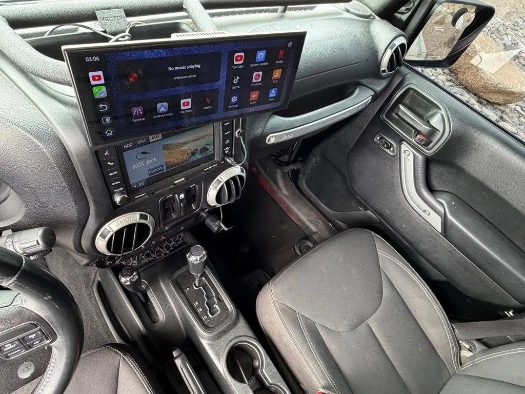 Used 2018 Black Jeep Unlimited Sahara image 18