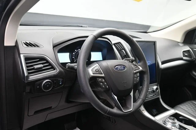 Certified Used 2024 Stone Blue Metallic Ford Titanium image 9