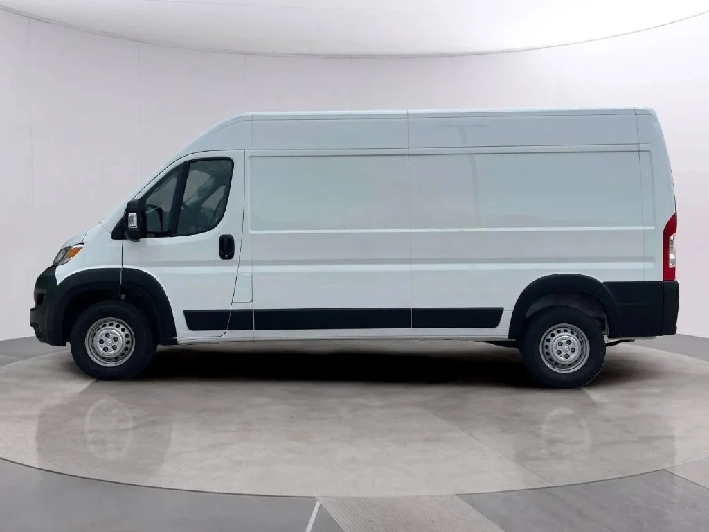 Used 2025 Bright White Clearcoat Ram High Roof image 2