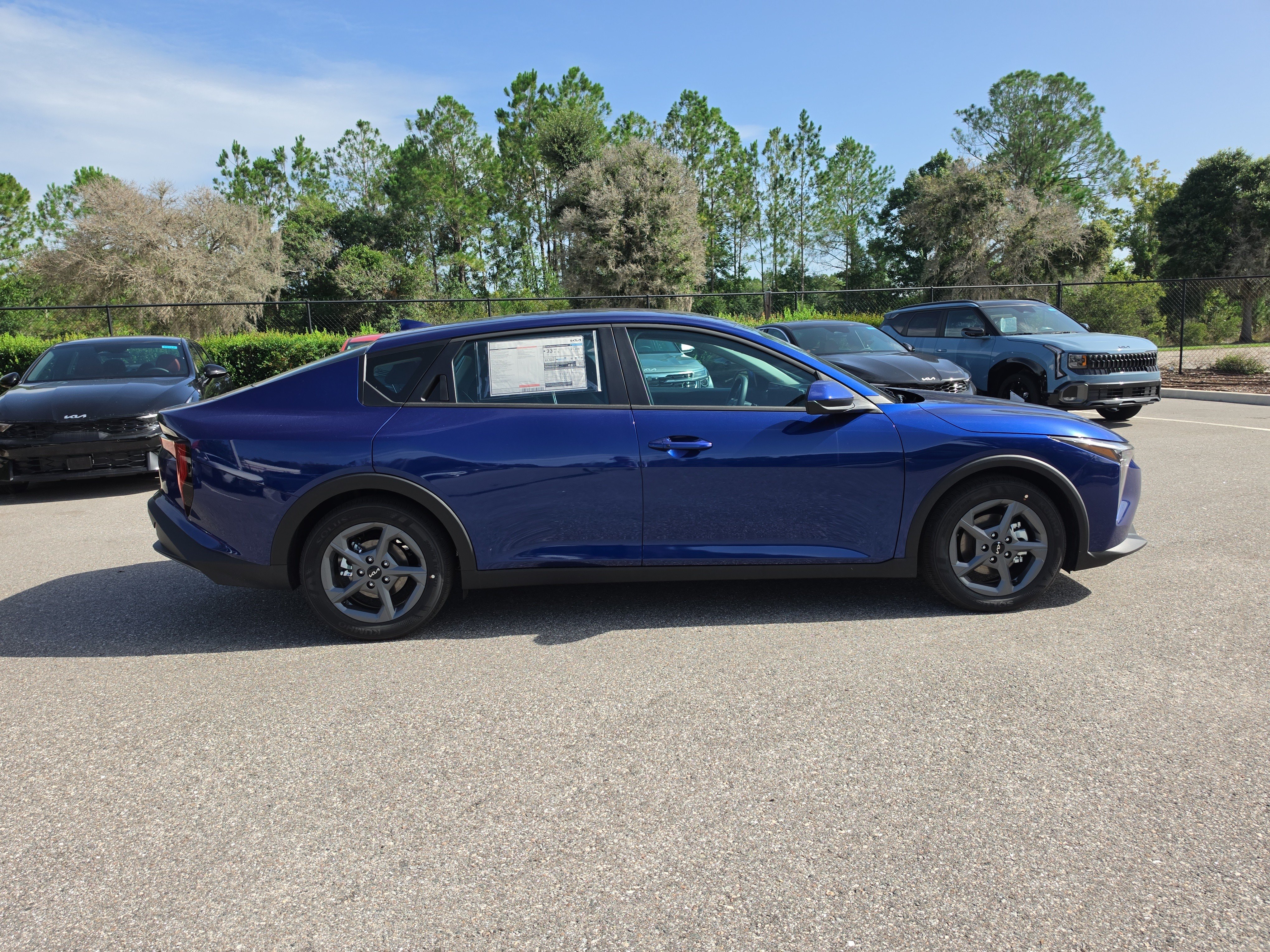 New 2026 Deep Sea Blue Kia LXS image 9
