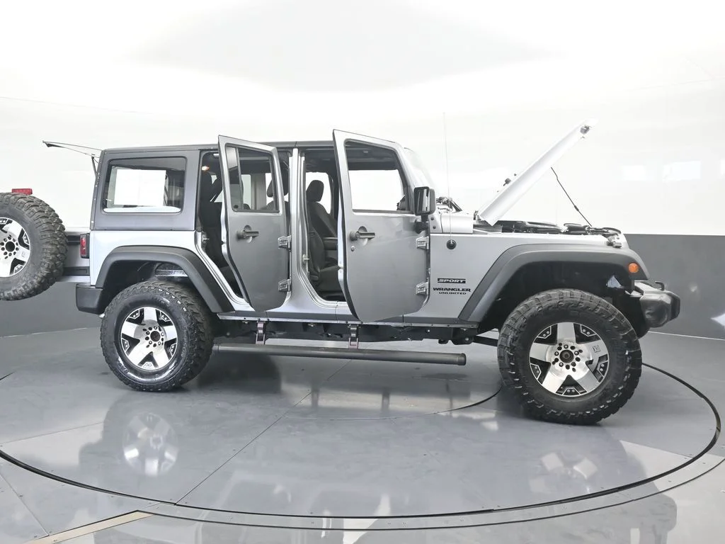 Used 2016 Billet Silver Metallic Clearcoat Jeep Unlimited Sport image 68