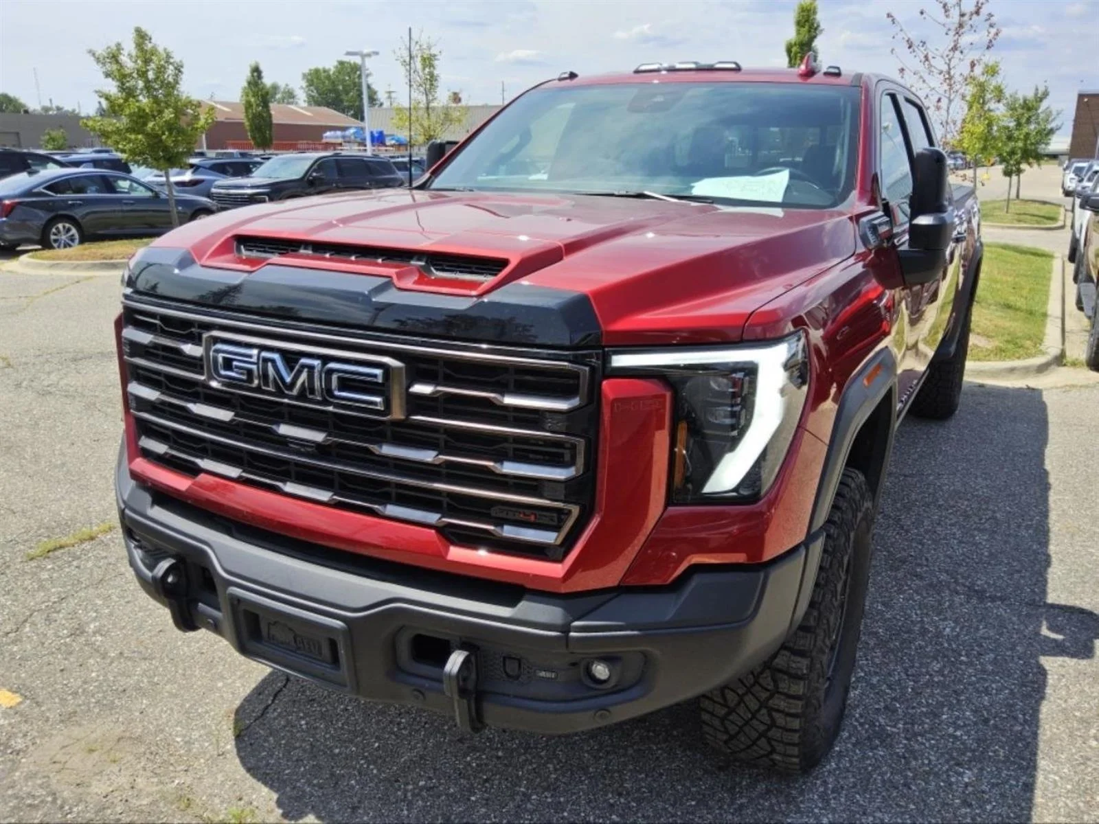 Used 2026 Volcanic Red Tintcoat GMC AT4X image 3