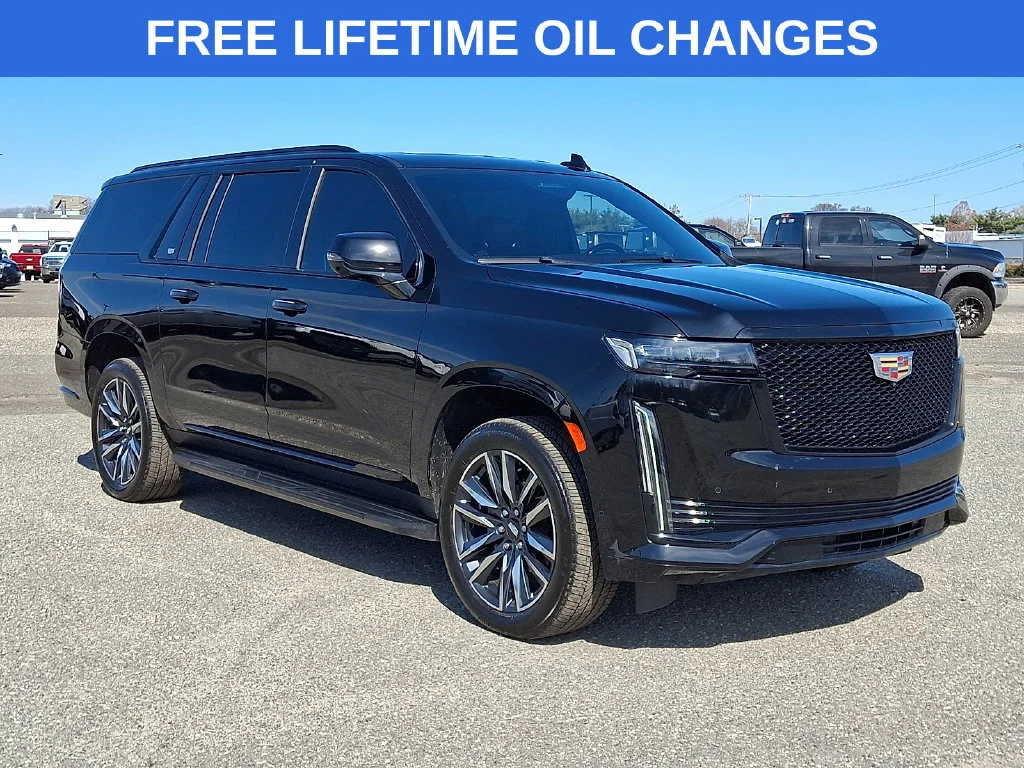Used 2023 Black Raven Cadillac Sport image 1