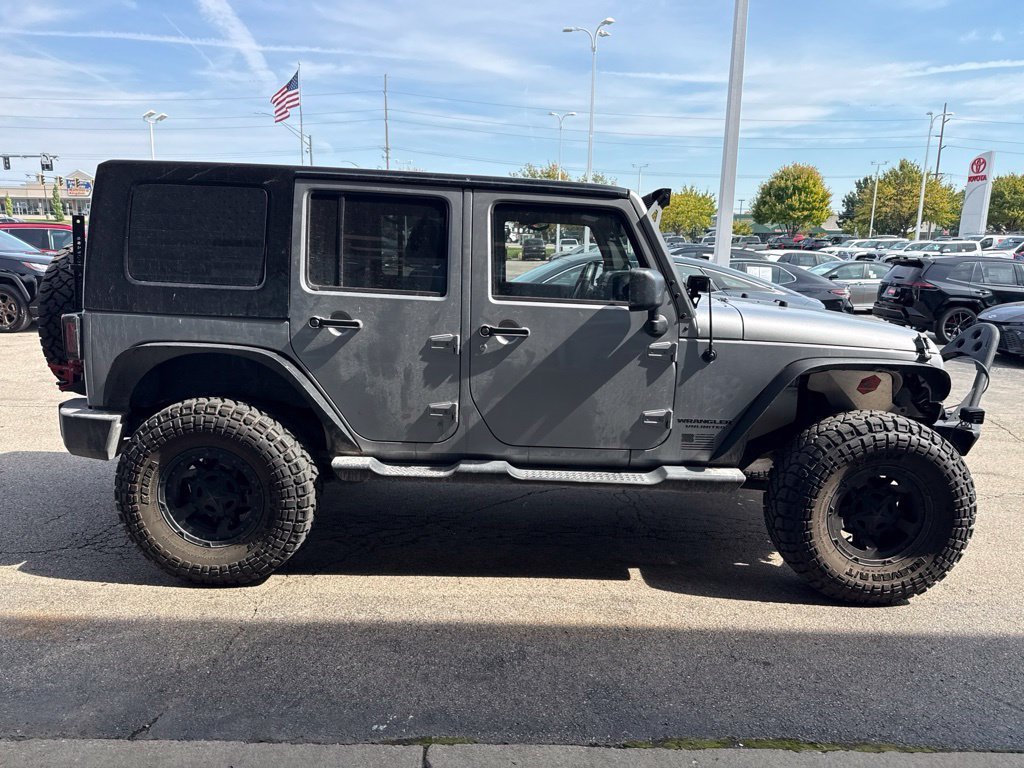 Used 2014 Jeep Wrangler Unlimited Sport with VIN 1C4BJWDG2EL218155 for sale in Miamisburg, OH
