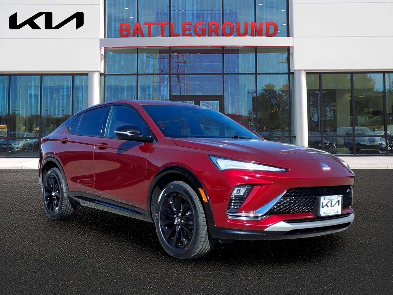 Used 2024 Cinnabar Metallic Buick Sport Touring image 1
