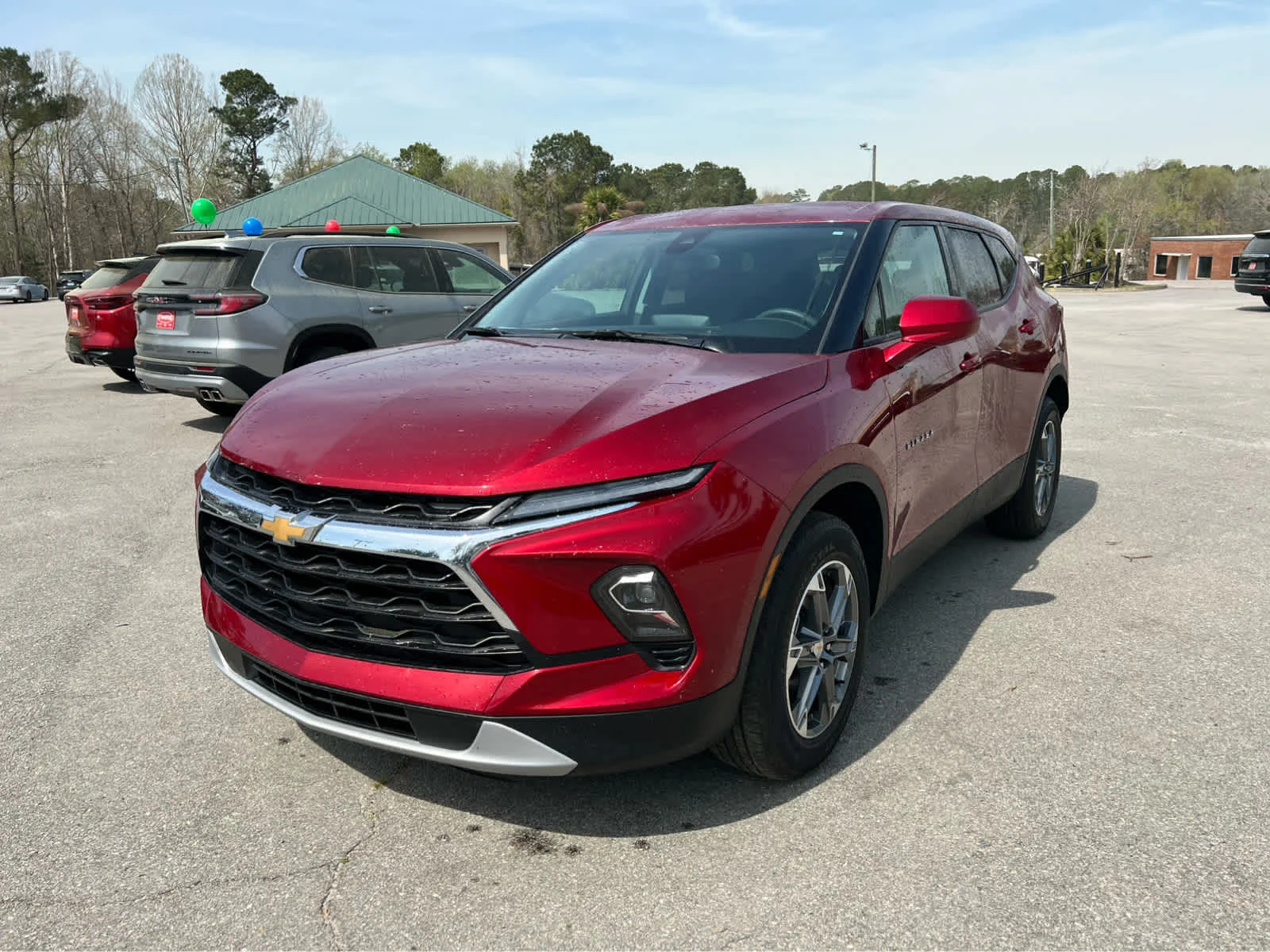 Used 2025 Radiant Red Tintcoat Chevrolet 2LT image 1