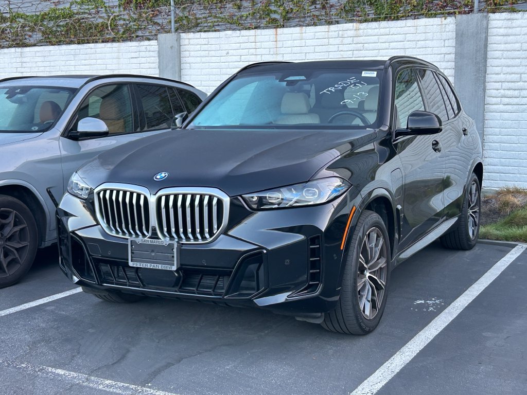 Certified Used 2024 Black Sapphire Metallic BMW xDrive50e image 2