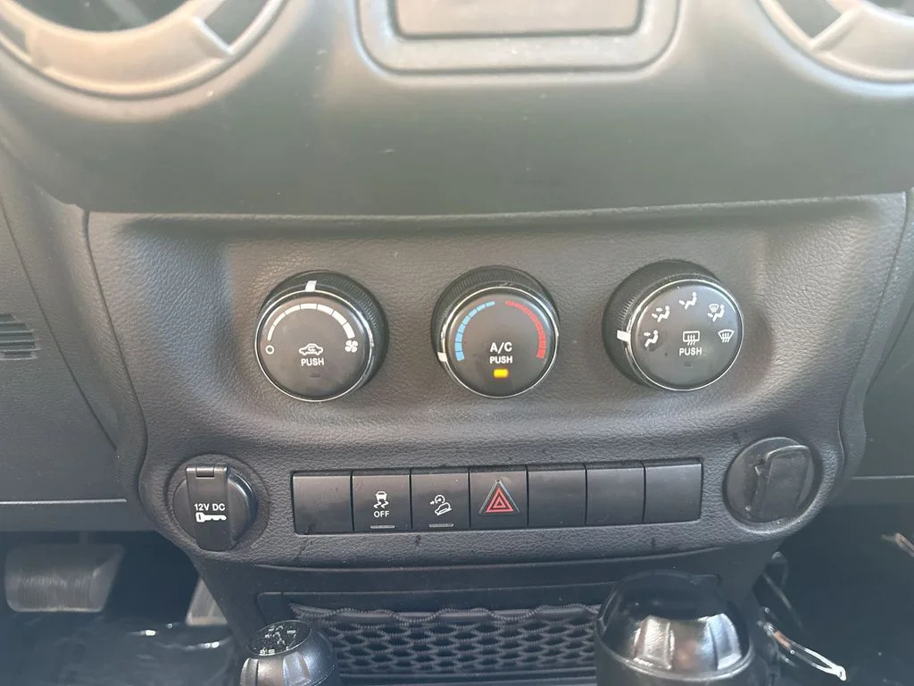 Used 2013 Black Jeep Unlimited Sport image 17