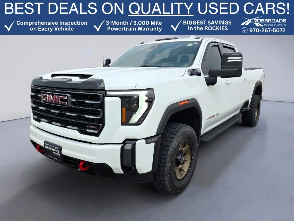 Used 2024 Summit White GMC AT4 image 1