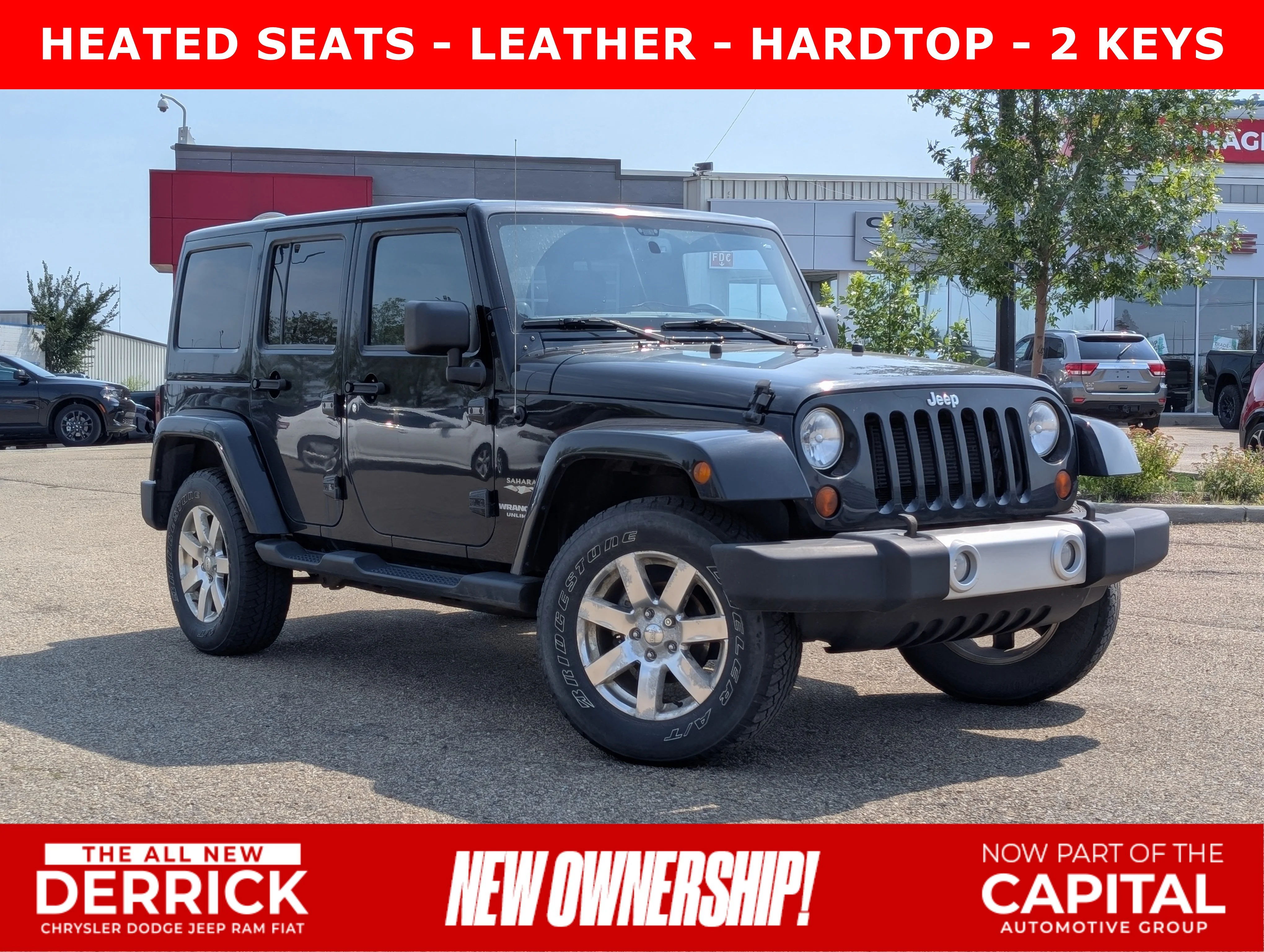 Used 2013 Black Jeep Sahara image 1
