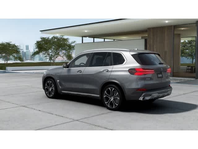 Used 2026 Skyscraper Grey Metallic BMW xDrive50e image 2