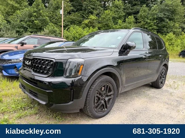 Used 2024 Black Kia EX X-Line image 2