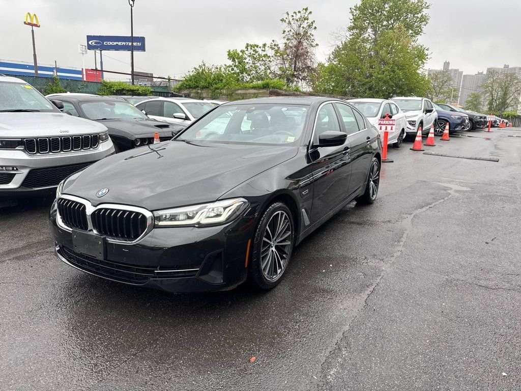 Used 2023 Black BMW 530e iPerformance image 1