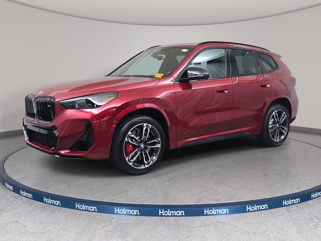 New 2026 Vegas Red Metallic BMW M35i image 1