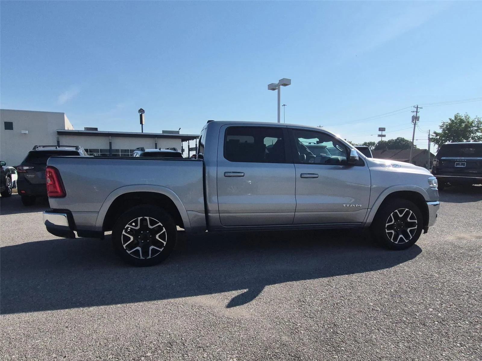 Used 2025 Billet Silver Metallic Clearcoat Ram Laramie image 6