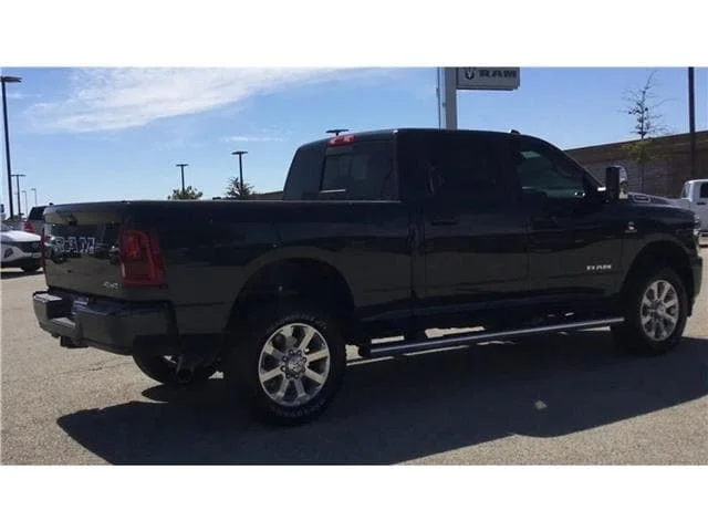 New 2026 Forged Blue Metallic  Paint Ram LARAMIE CREW CAB 4X4 6