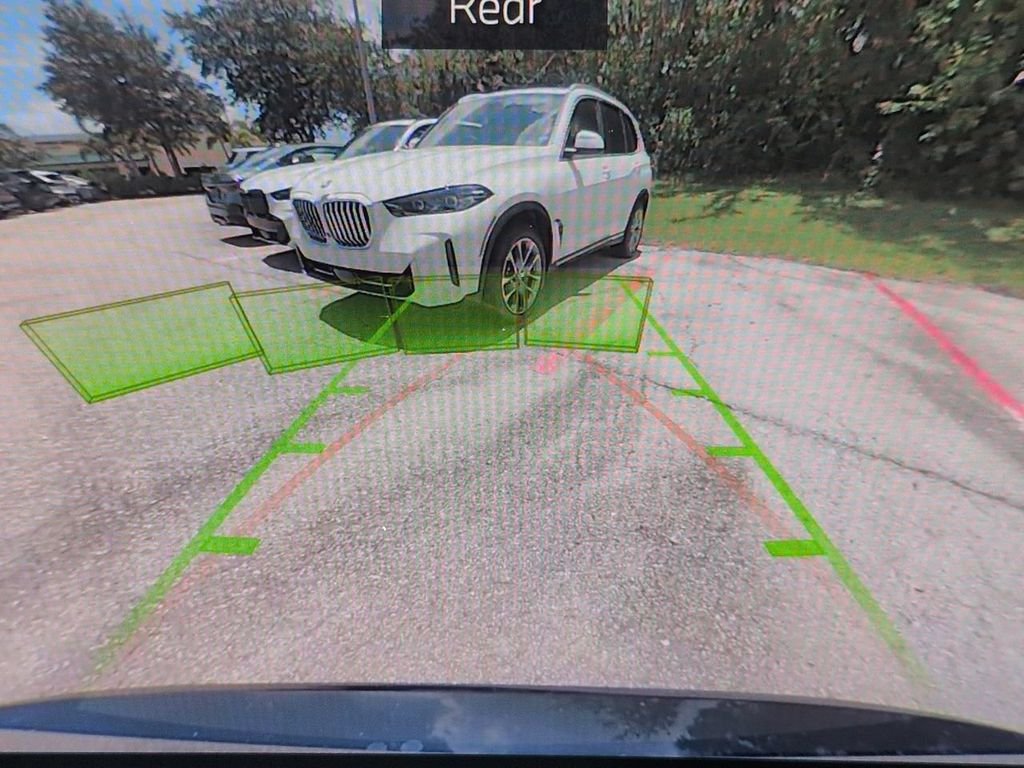 New 2026 Tanzanite Blue II Metallic BMW xDrive50e image 21