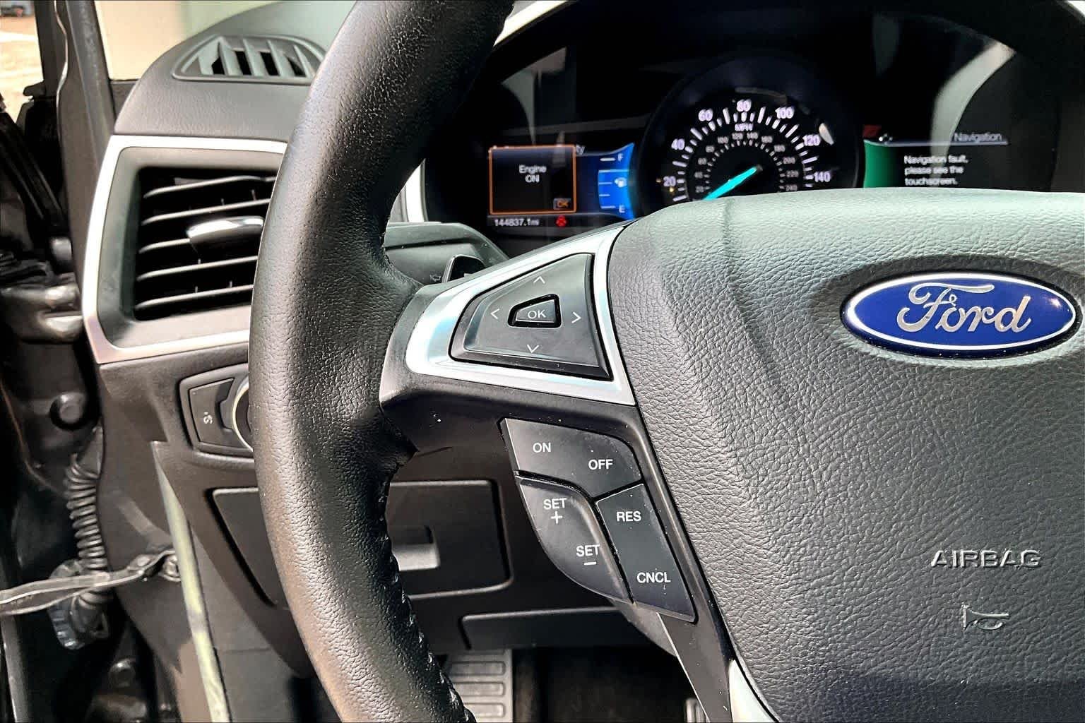 Used 2015 Magnetic Metallic Ford SEL image 26