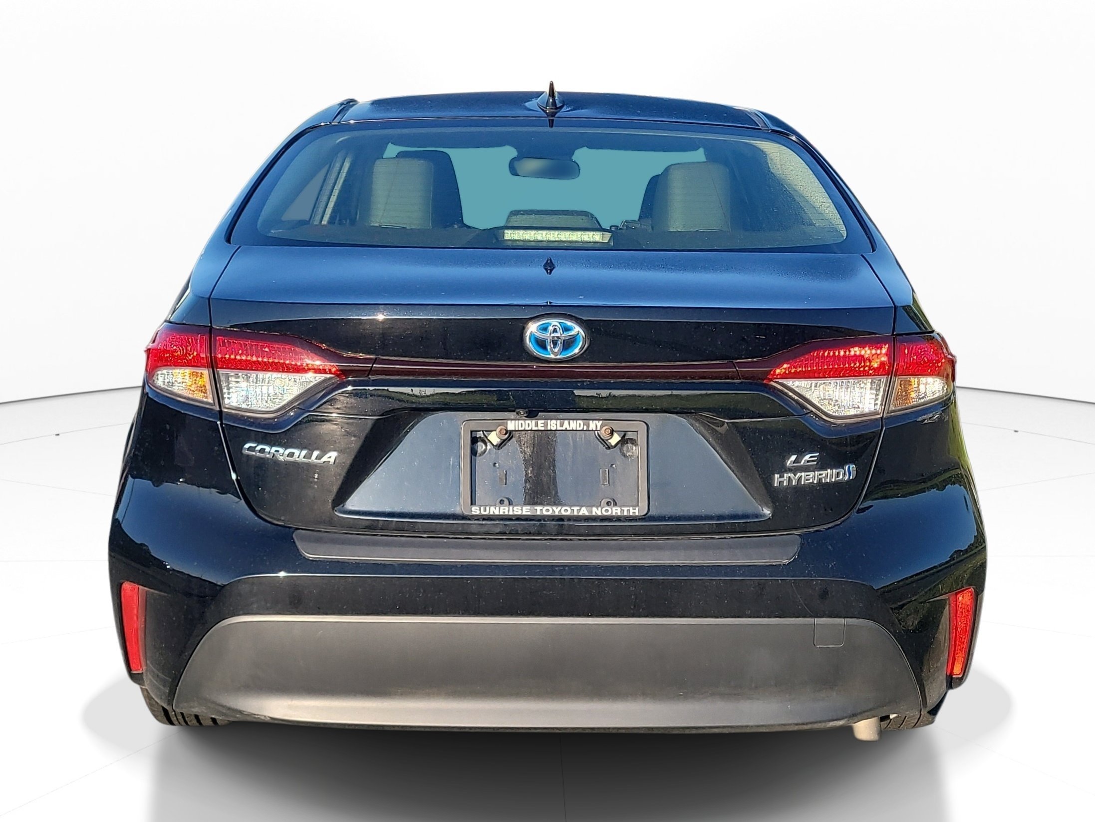 Used 2023 Midnight Black Metallic Toyota Hybrid LE image 5