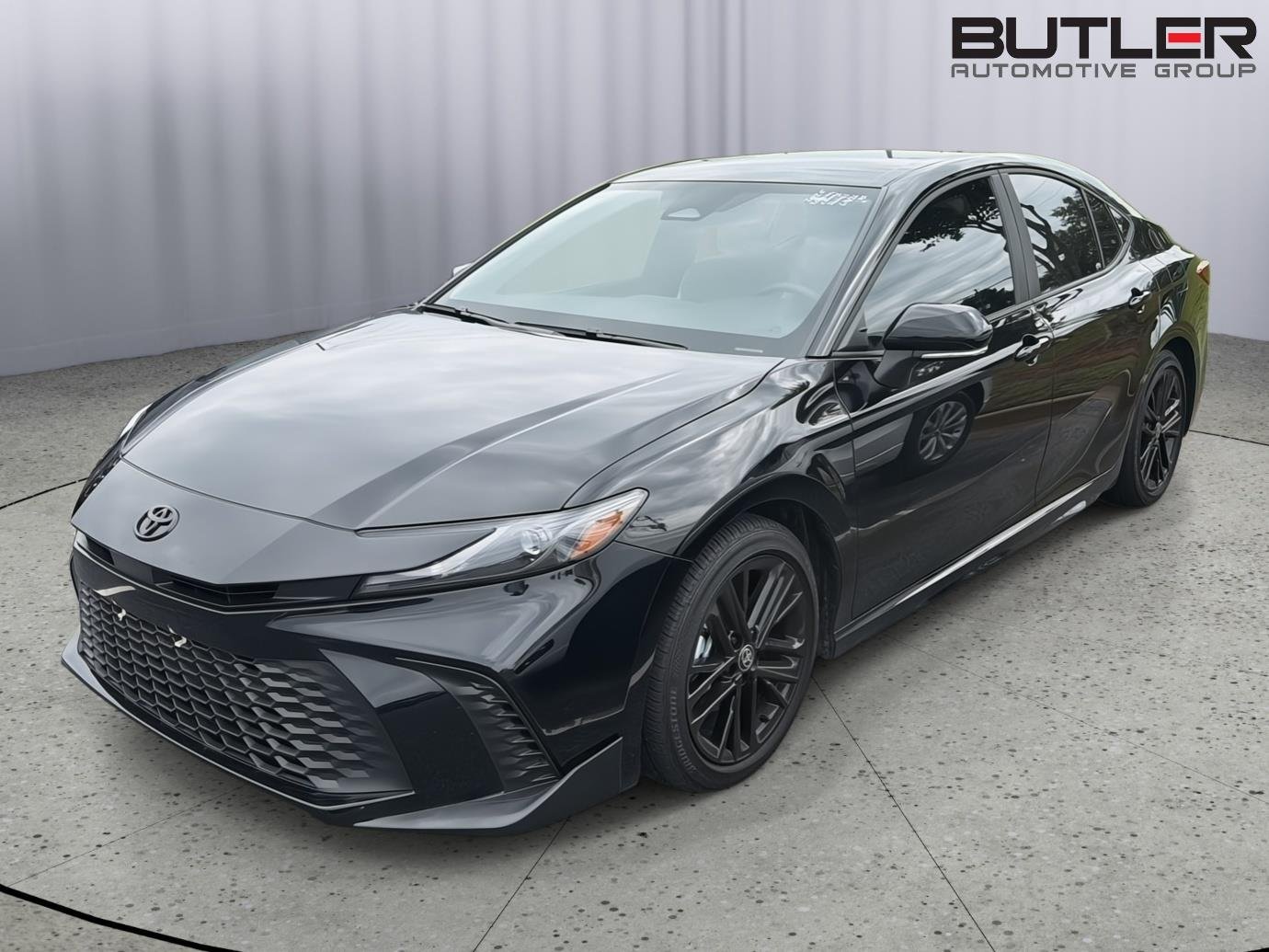 Used 2025 Midnight Black Metallic Toyota SE image 1