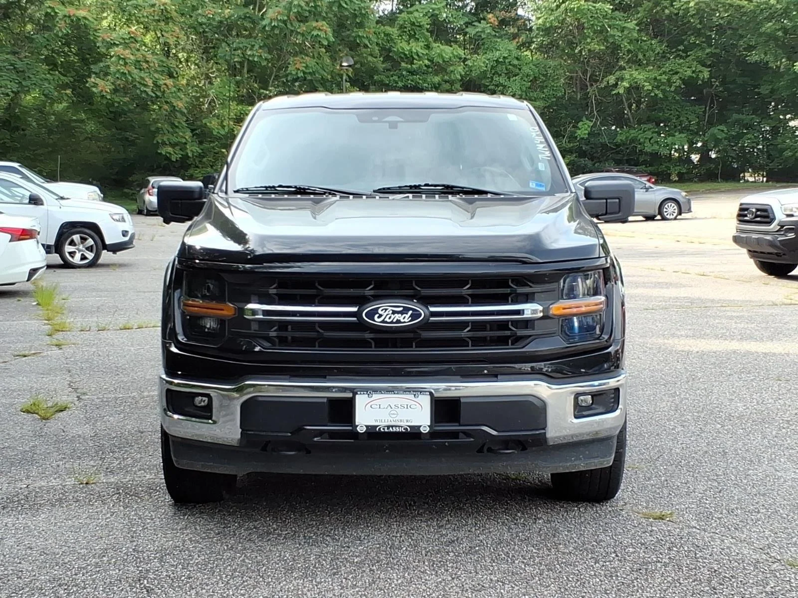 Used 2024 Agate Black Metallic Ford XLT image 2