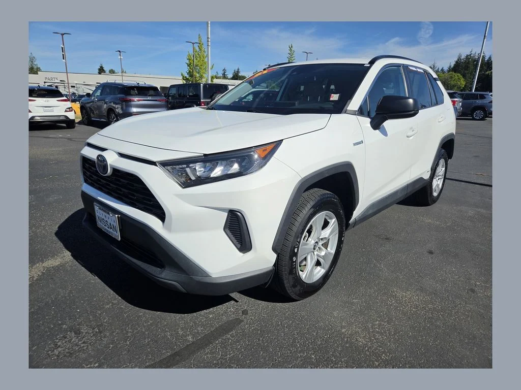Used 2021 White Toyota LE image 1