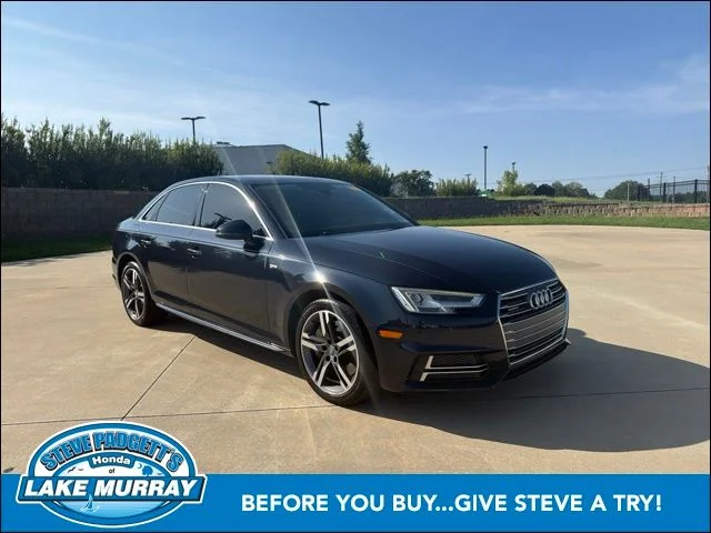 Used 2018 Moonlight Blue Metallic Audi 2.0T Premium image 1