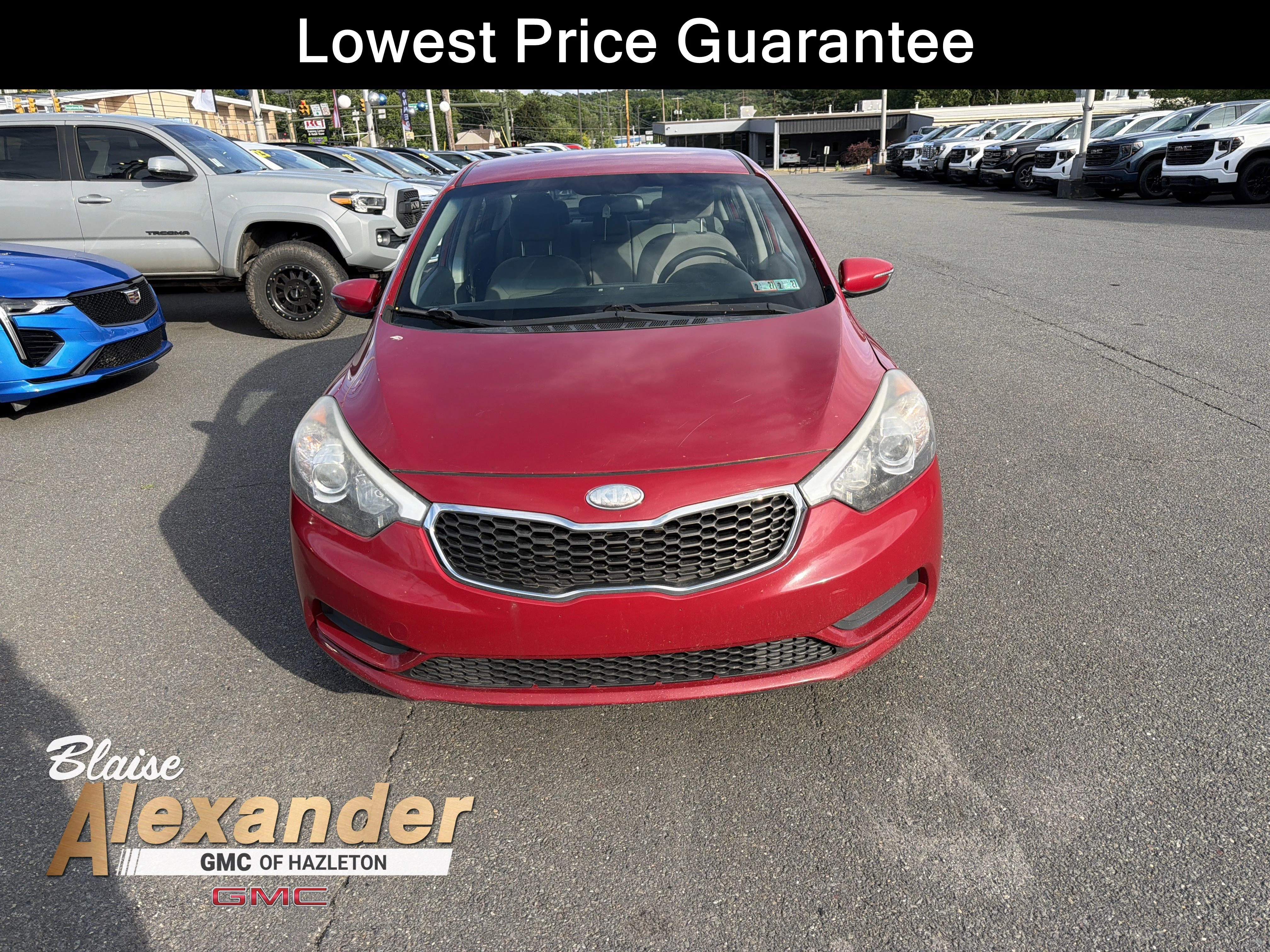 Used 2014 Crimson Red Kia LX image 1
