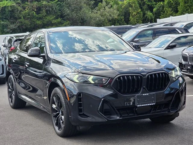 Certified Used 2024 Black Sapphire Metallic BMW xDrive40i image 3