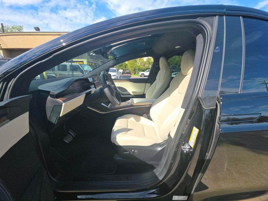 Used 2024 Solid Black Tesla Base image 2