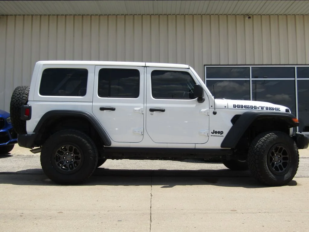 Certified 2023 Jeep Wrangler 4-Door High Tide with VIN 1C4HJXDG1PW677470 for sale in Kansas City