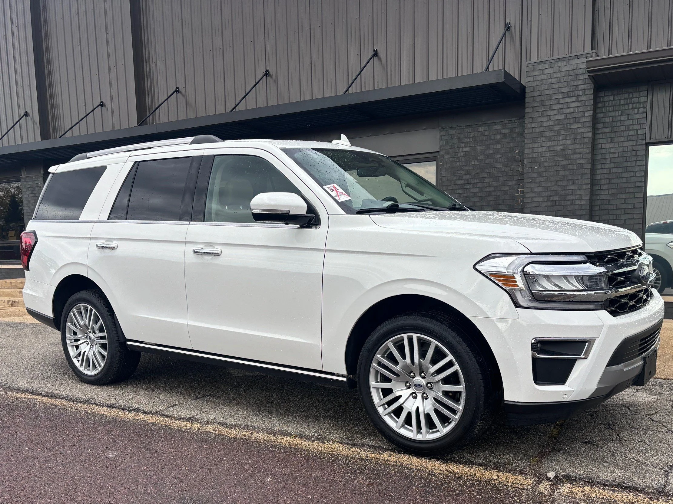 Used 2024 White Metallic Ford Limited image 3