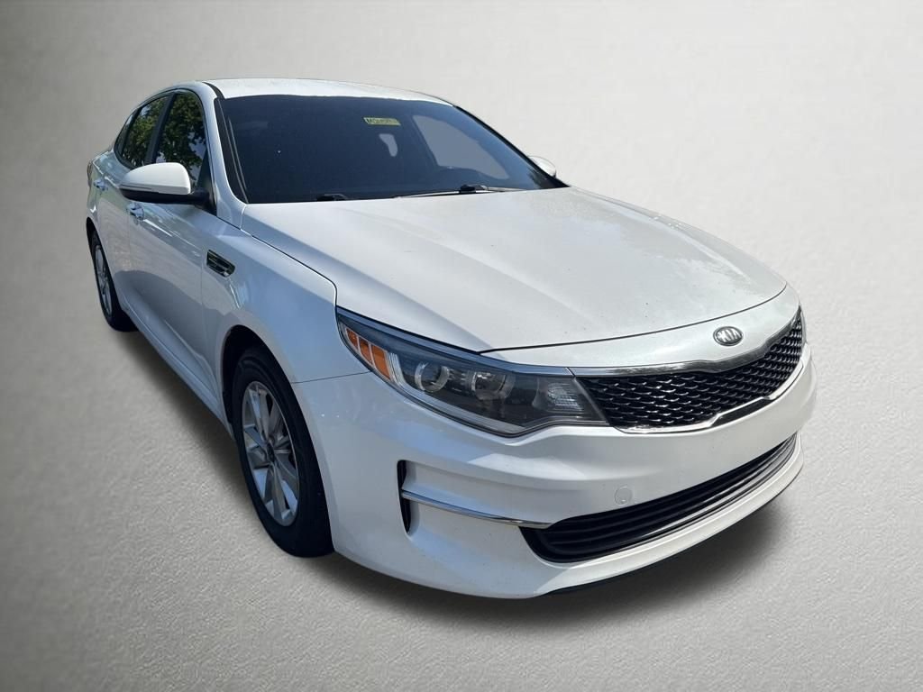 Used 2016 Snow White Pearl Kia LX image 1