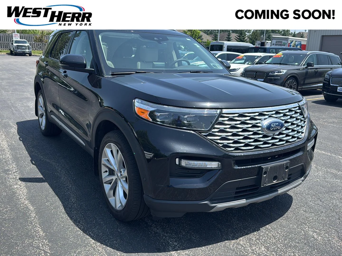 Used 2023 Agate Black Metallic Ford Platinum image 1