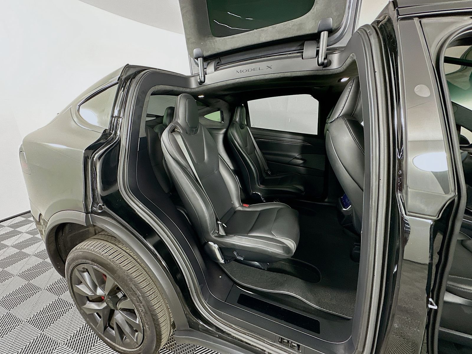 Used 2023 Solid Black Tesla Plaid image 28
