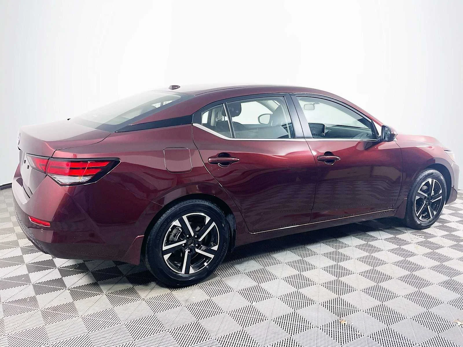 Used 2025 Rosewood Metallic Nissan SV image 2