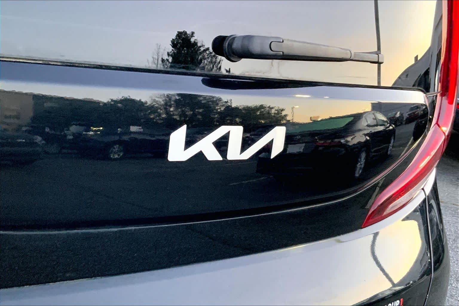 Used 2022 Cherry Black Kia LX image 9