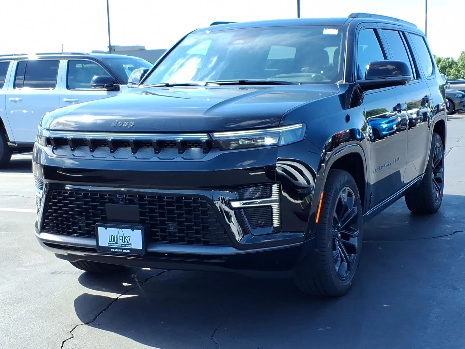New 2026 High Gloss Black Exterior Paint Jeep Summit Obsidian image 2