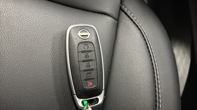 Used 2025 Deep Ocean Blue Pearl/Super Black Nissan SL image 21